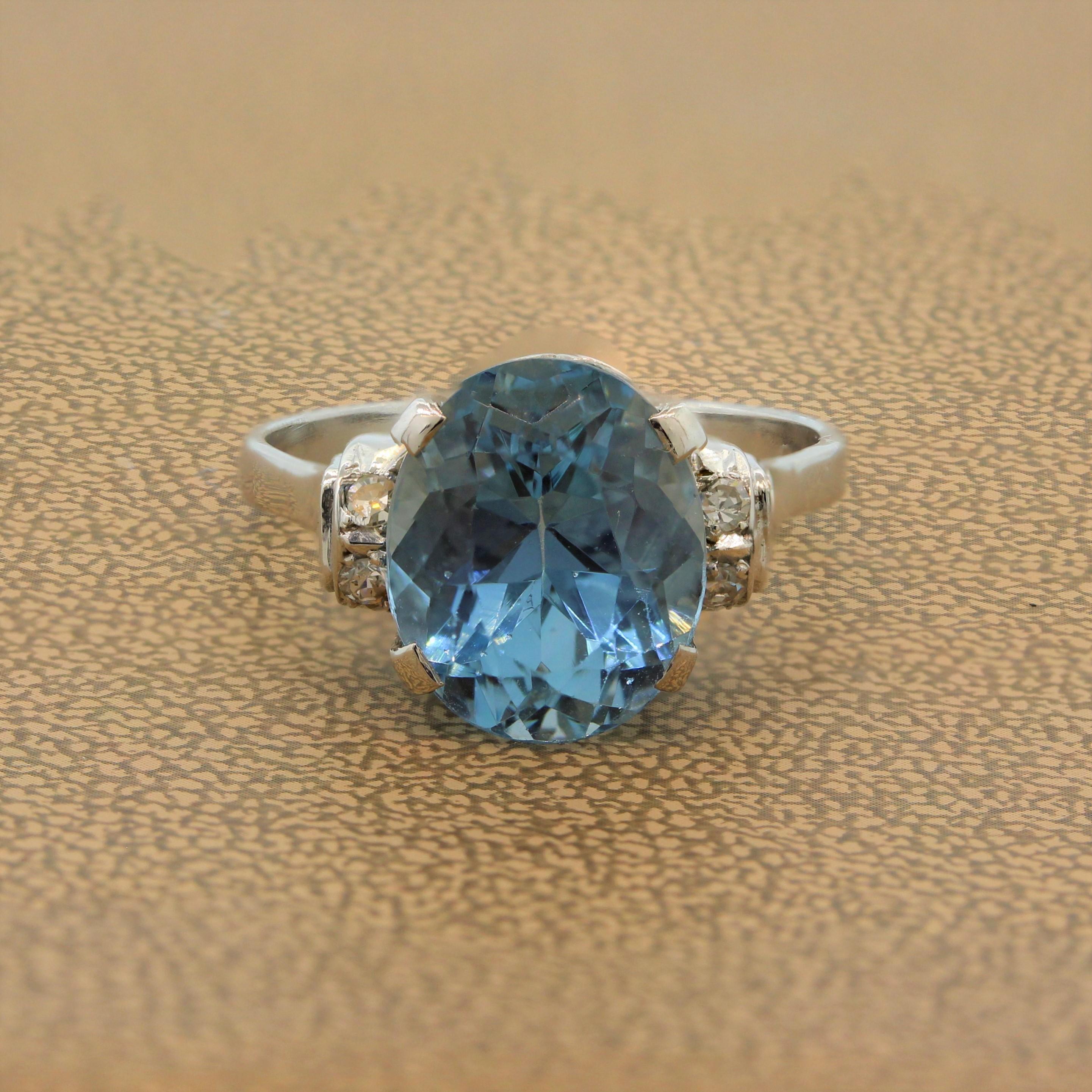 An estate ring featuring an exquisite aquamarine weighting approximately 10.00 carats. The oval cut aquamarine as a rich ocean blue color and is accented by a touch of diamonds to bring out added shine to this platinum ring.

Ring Size 9.5 (Sizable)
