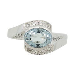 Anello in platino con diamante e acquamarina