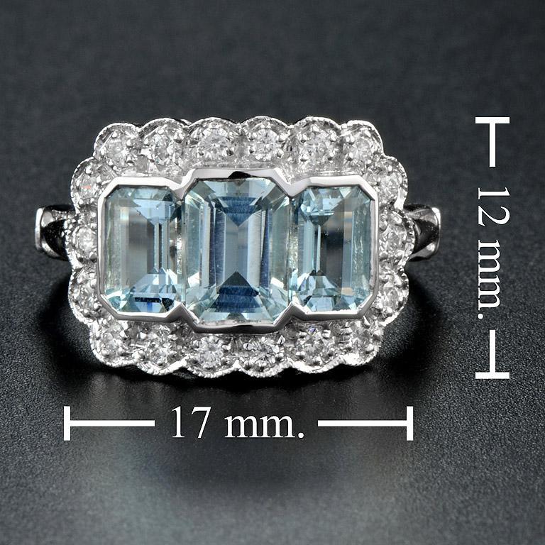 Ring aus Platin950 mit drei Steinen, Aquamarin im Smaragdschliff und Diamant () 6