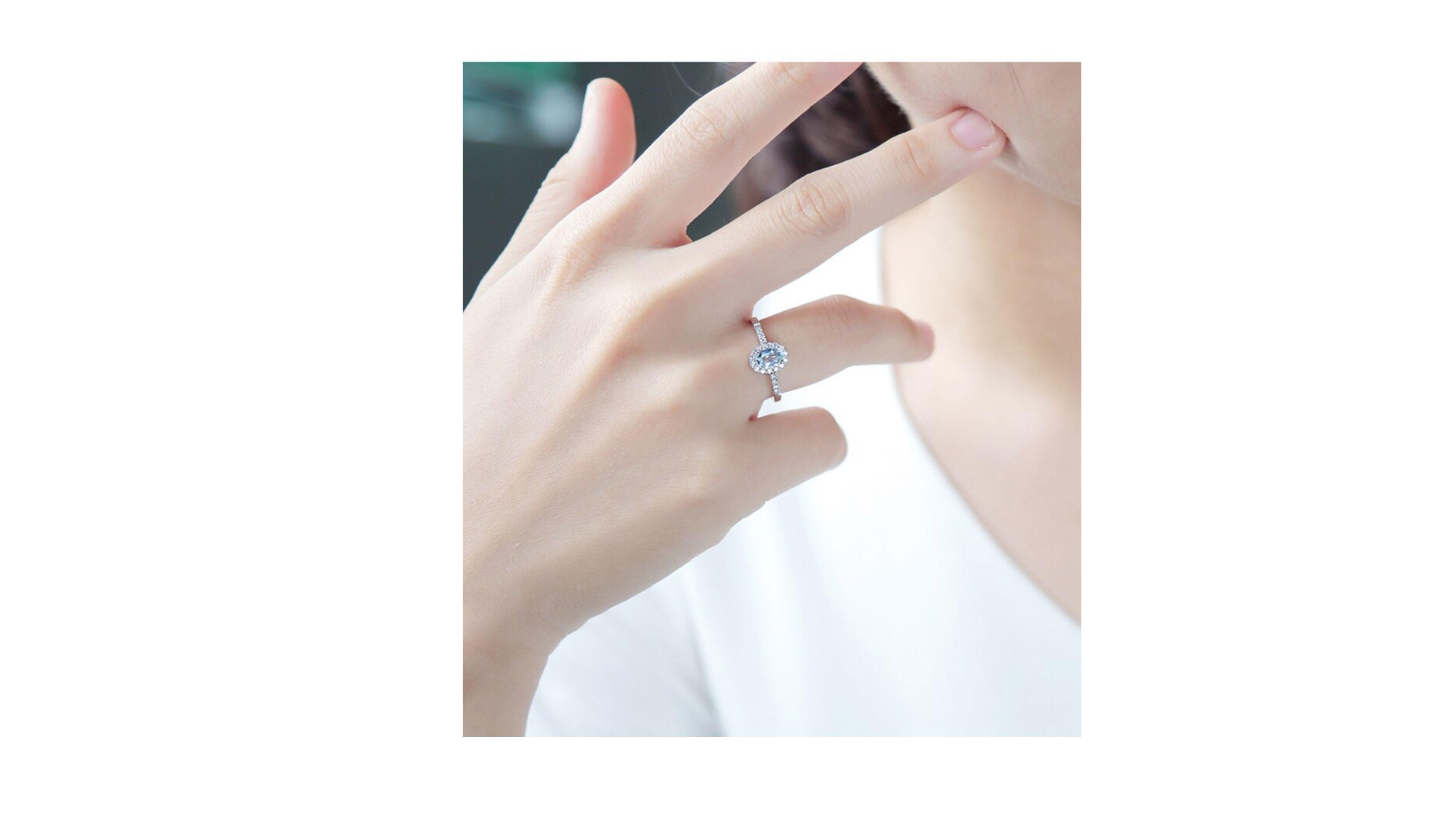 Oval Cut Aquamarine Diamond Ring 18 Karat White Gold For Sale