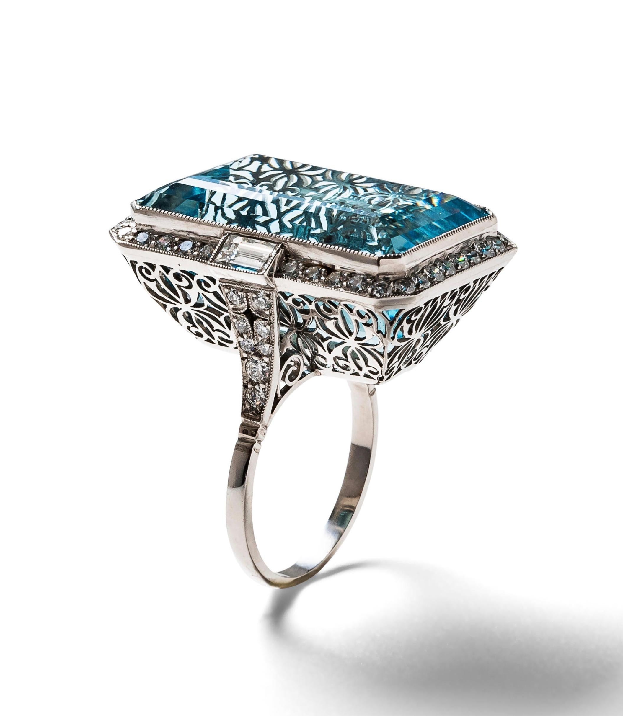 Aquamarine and diamond ring 

Bezel-set with a large rectangular emerald-cut aquamarine (24 x 15.5 x 12.10 mm) of approximately 30 carats, framed by baguette and full-cut diamonds of approximately 1.5 carat; platinum

Size: 7 US
Total weight: 16.3