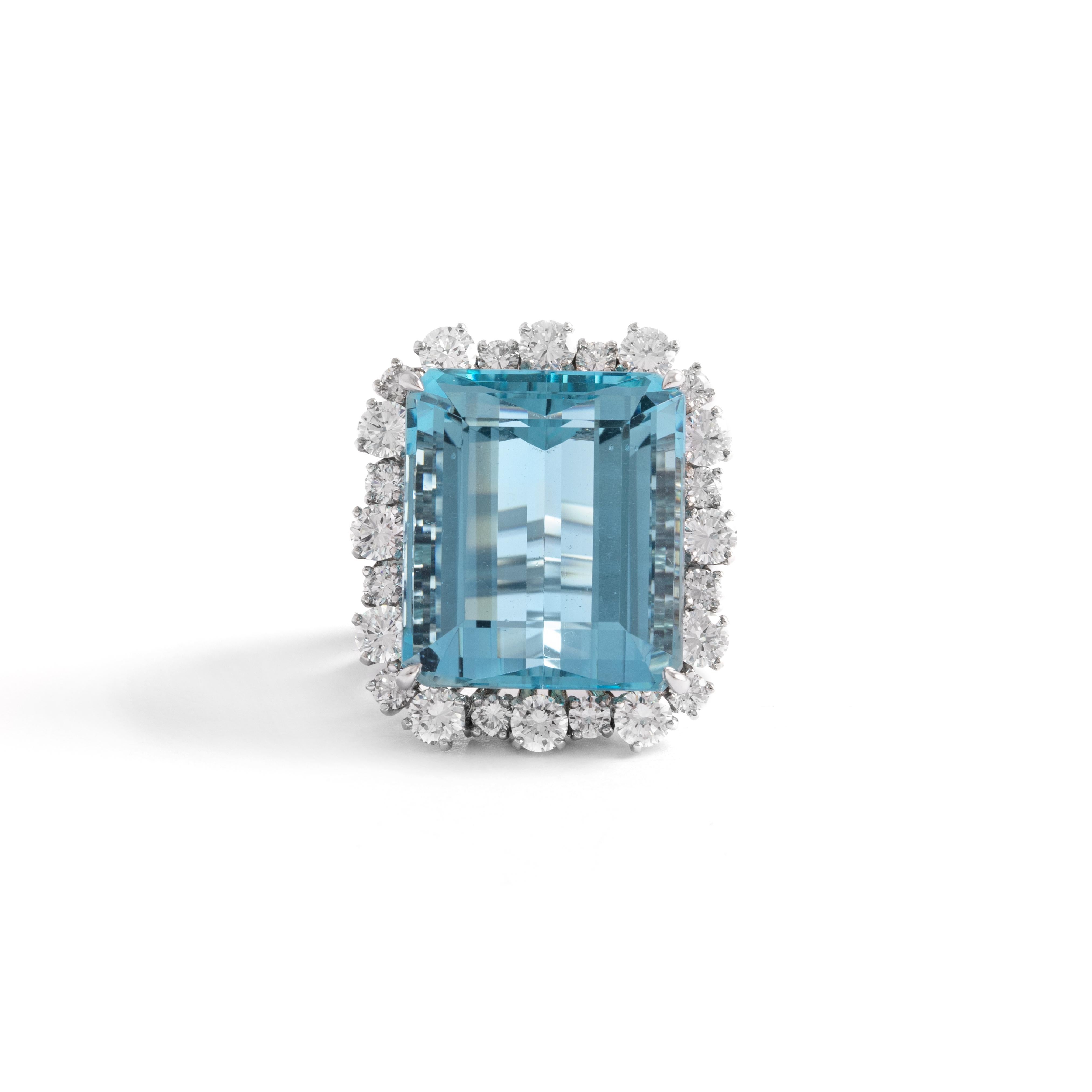 Ring set with 24 diamonds and one significant Aquamarine.
Aquamarine Size: 1.75cm x 2.00 cm.
Weight: 24.47 grammes.
Ring Size: 55 / 7 US.
