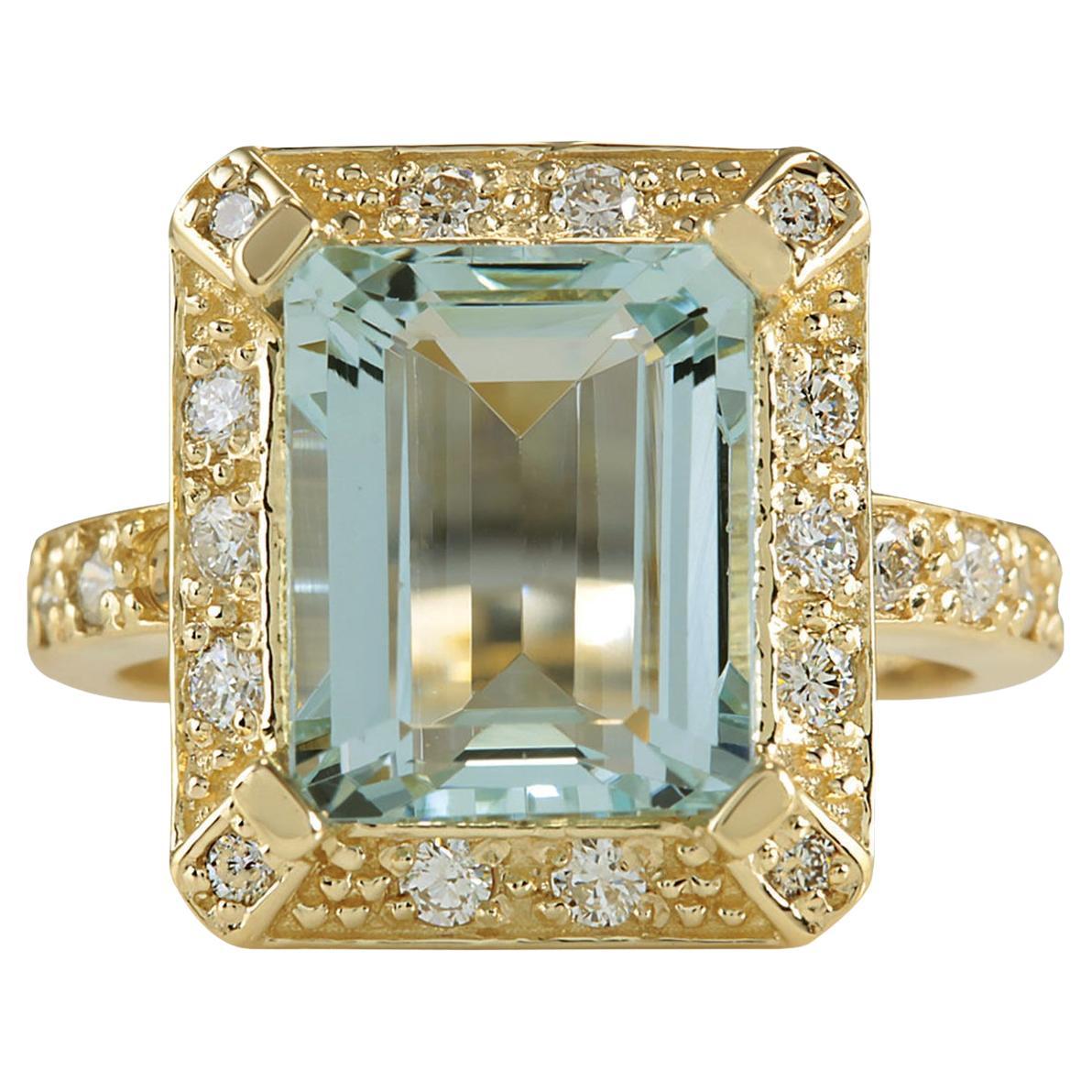 Bague en diamant avec aigue-marine naturelle rayonnante : Elegance en or jaune 14 carats