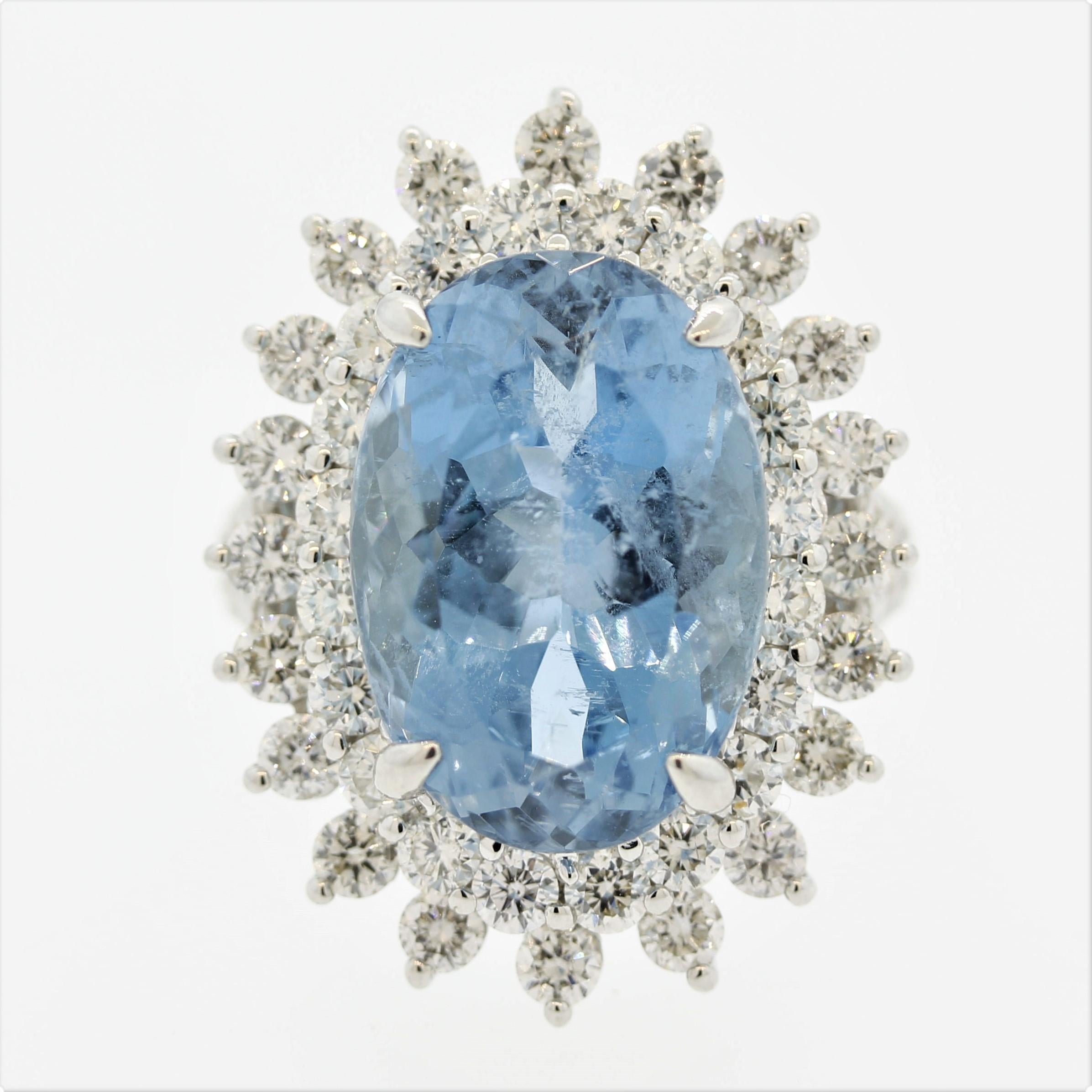 A lovely and substantial ring featuring a 11.72 carat aquamarine with the ideal gem blue color. The top-quality stones in the trade are referred to as “Santa Maria” which refers to the best pocket of aquamarines found a century ago in Brazil. This