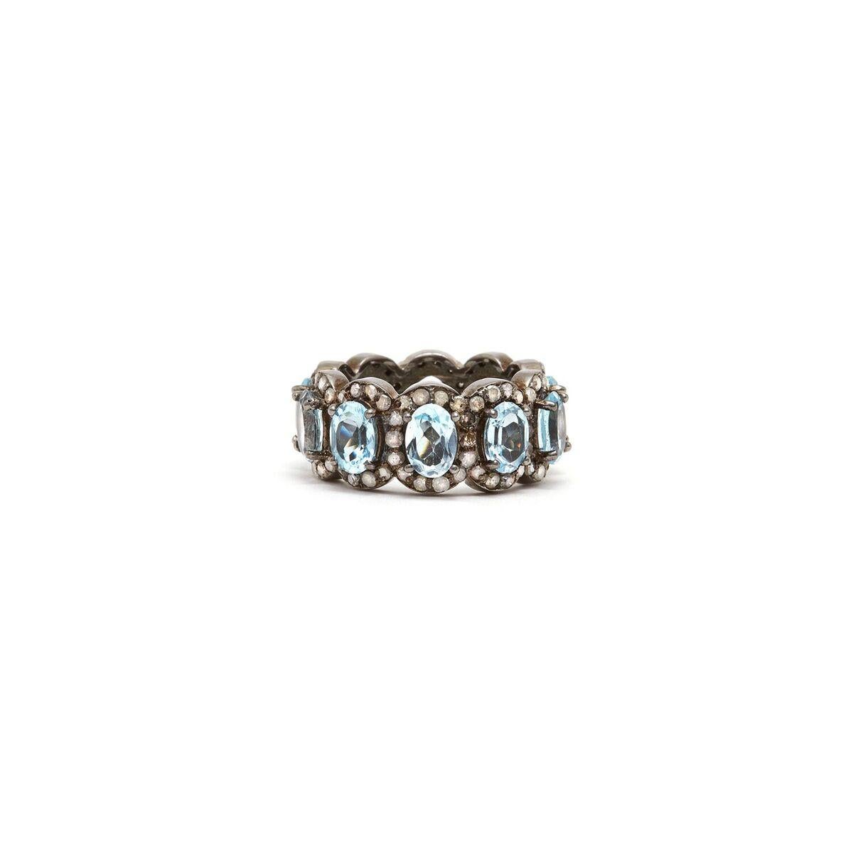 Ice blue Aquamarine baguettes accented with Diamonds in a blackened silver band reminiscent of an Art Deco Tiara.

- Natural Ice Blue Aquamarine.
- White Diamonds.
- Set in Blackened Oxidized Silver.