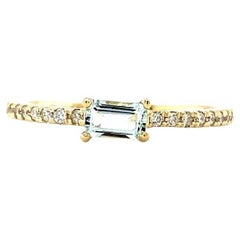 Anillo de cóctel de oro amarillo con aguamarina y diamante