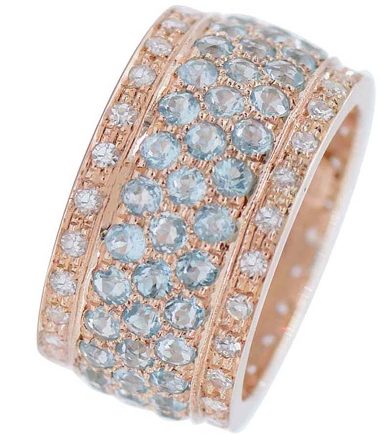 Amazing  band ring in 14 kt rose gold structure mounted with a row of diamonds externally and, in the middle, is studded with aquamarine.
Diamonds 0.92 ct
Aquamarine 5.73 ct
Total Weight 6.50 gr
RF  +OOFC
RK.AIGO80
Italian Size 16
Usa Size