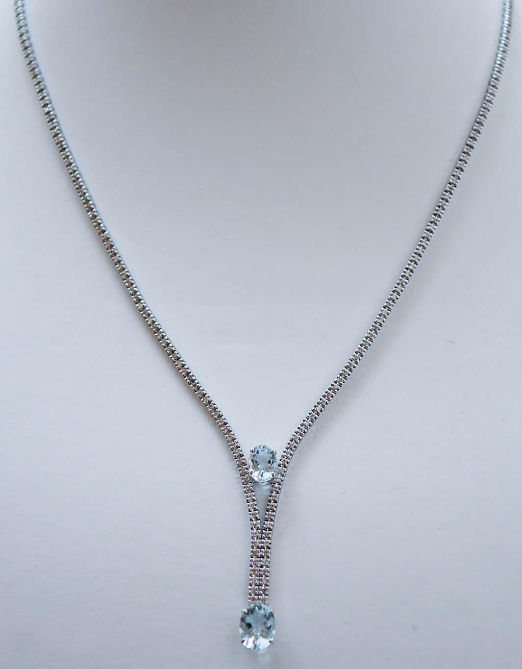 Fantastic tennis necklace in 14 kt white gold structure mounted with diamonds for all the length. In the middle and as pendant an oval aquamarine.
Diamonds 1.90 ct
Aquamarine 3.32 ct
Total Weight 14.50 gr
RF  ++EFRA

For any informations, feel free