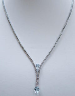 Aquamarine, Diamonds, 14 Karat White Gold Tennis Necklace.