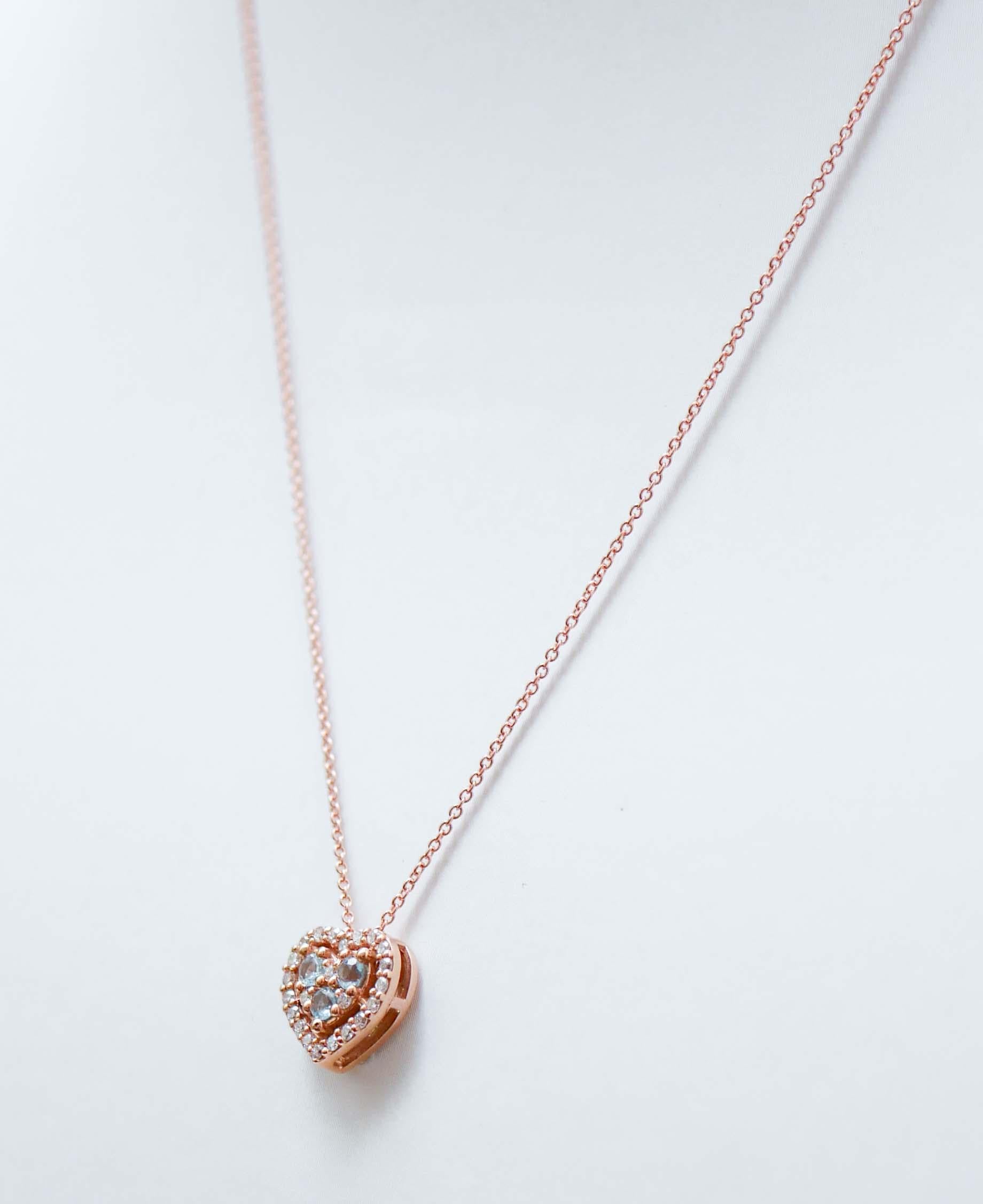 Modern Aquamarine, Diamonds, 18 Karat Rose Gold Heart Pendant Necklace. For Sale