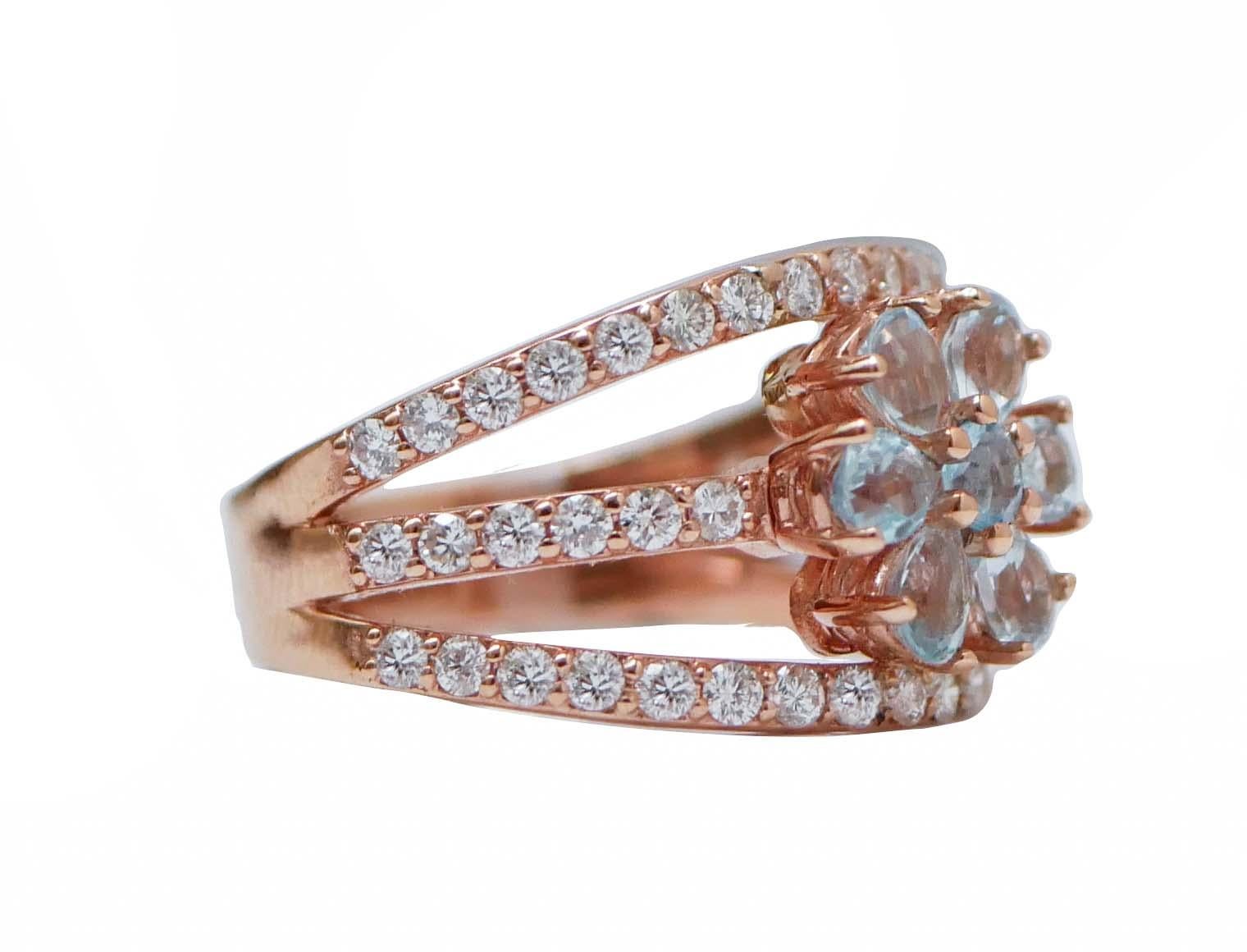 Fantastic ring in 18 kt rose gold structure composed by three rows of diamonds and, in the central part, a flower of aquamarine.
Diamonds 0.98 ct
Aquamarine 1.37 ct
Total Weight 6.80 gr
RF  +OAGG
Italian Size 16
Usa Size 7.5
French Size 56

For any