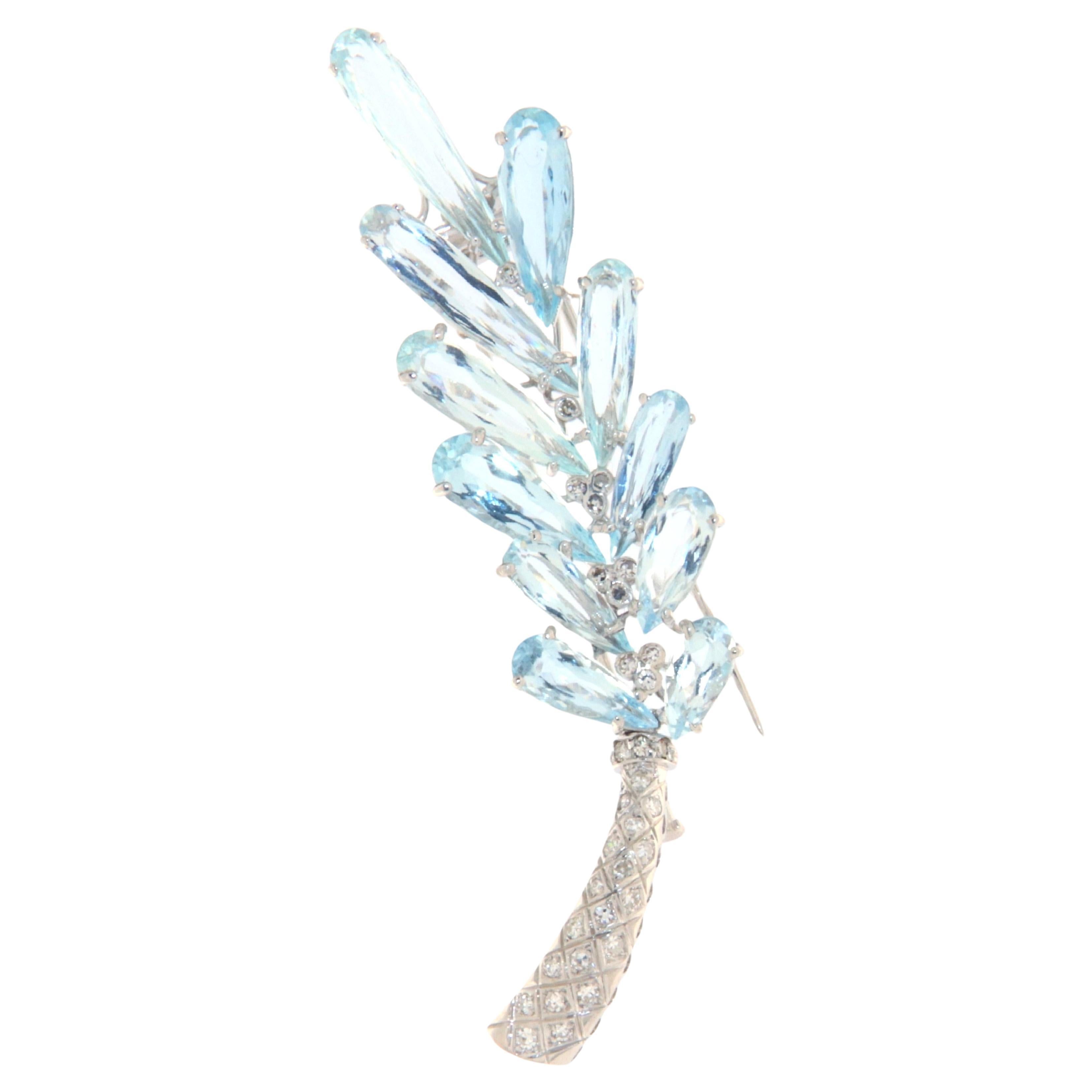 Broche de oro blanco de 18 quilates con diamantes aguamarina