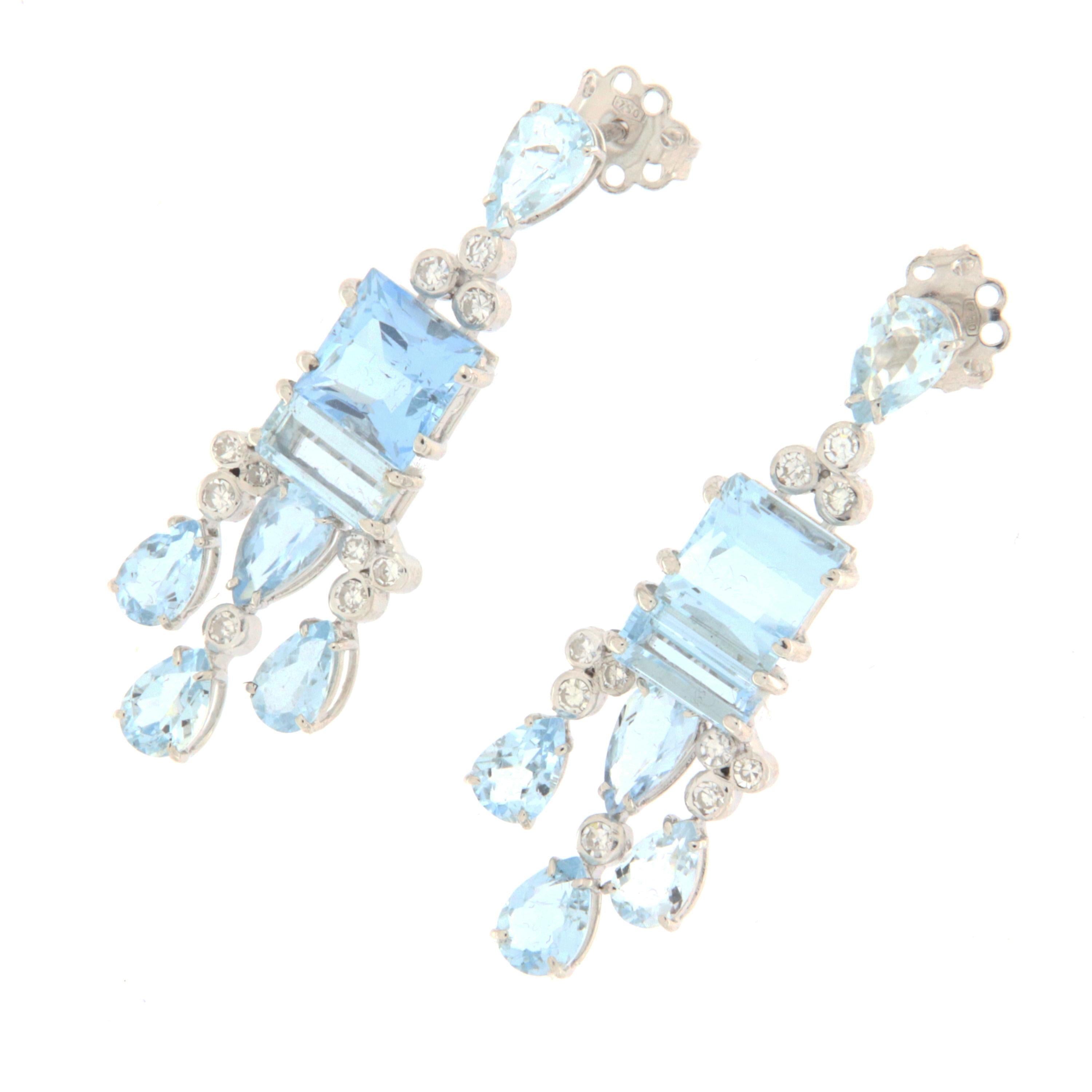 Delightful earring made entirely by hand by expert Neapolitan goldsmiths in 18-karat white gold. aquamarine of Brazilian origin are supported by diamonds.
A splendid delicate jewel that cannot be missing from a woman's collection, which can be
