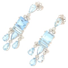 Boucles d'oreilles pendantes en or blanc 18 carats aigue-marine et diamants