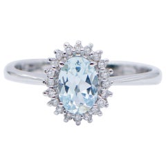 Anello con acquamarina, diamanti, oro bianco 18 carati