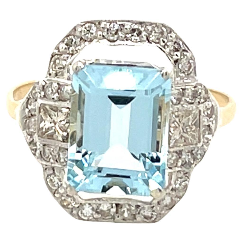 Anello con acquamarina e diamanti in oro giallo 14ct e argento