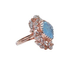 Aquamarine, Diamonds, Spinel, Rose Gold and Silver Ring.