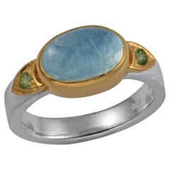 Anello con diopside di acquamarina in argento e placca d'oro