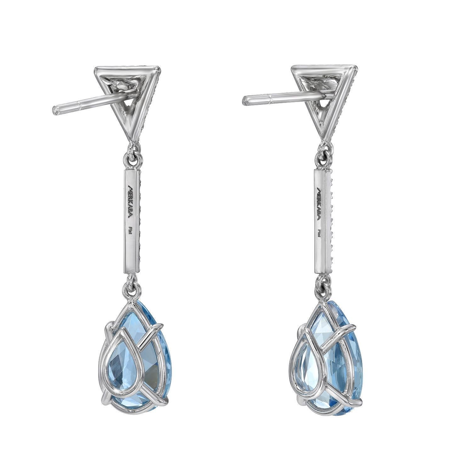 Top quality 4 carat Aquamarine pear shape platinum earrings, decorated with a total of 0.36 carat round brilliant collection diamonds, suspending from our signature three dimensional triangle diamond studs.
Crafted by extremely skilled hands in the