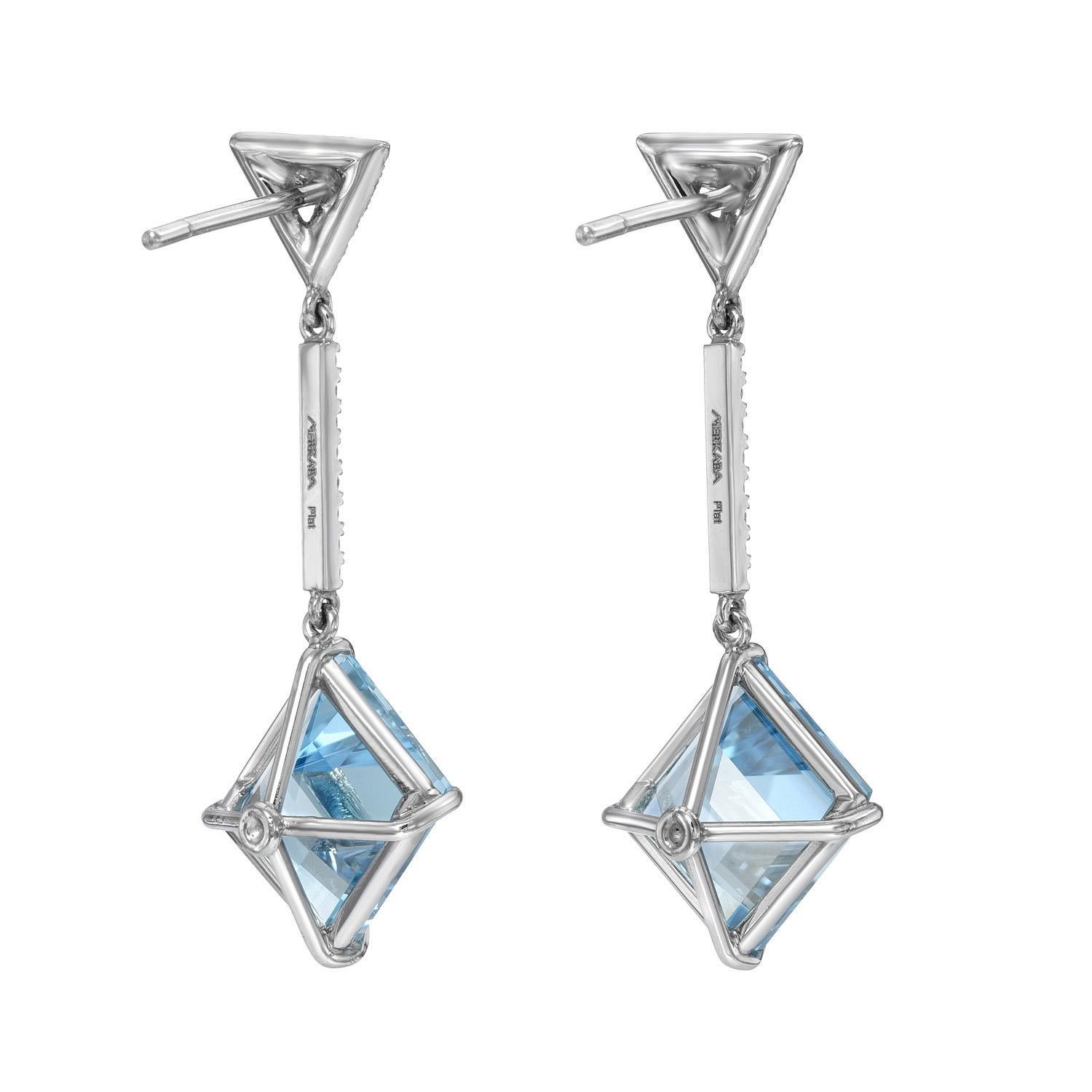 Exclusive 5.87 carat Aquamarine kite shaped platinum earrings, decorated with a total of 0.34 carat round brilliant collection diamonds, suspending from our signature three dimensional triangle diamond studs.
Crafted by extremely skilled hands in