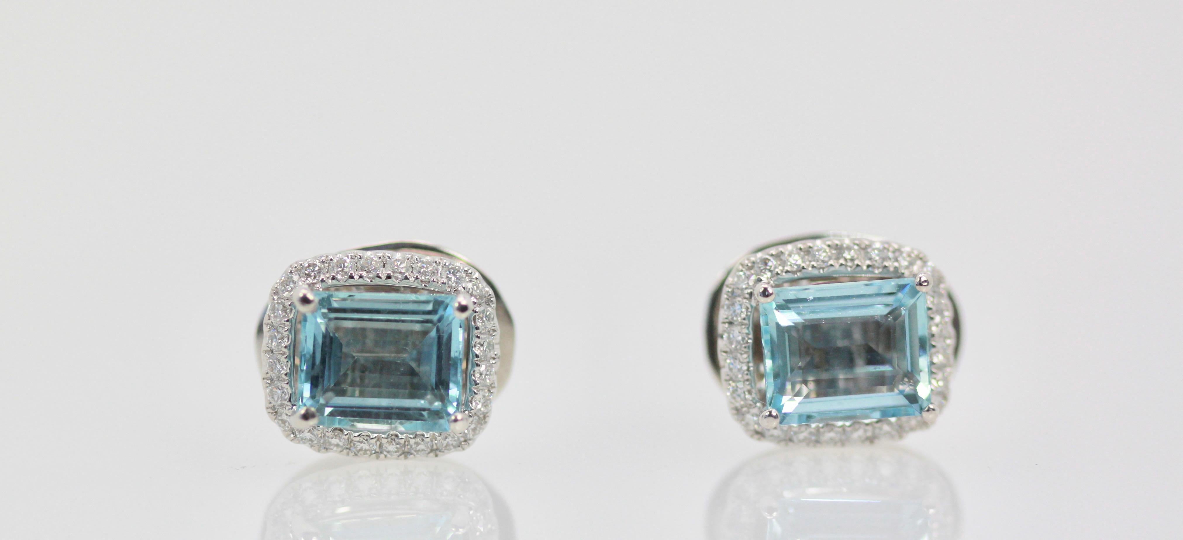 Aquamarine Earrings matches all the Aquamarine I have listed.  These were hand made for me by my local jeweler.  They boast Aquamarines very clean at 6.45 Carats each earrings to total 12.90 carats of Aquamarine.  They are surrounded by Diamonds G-H