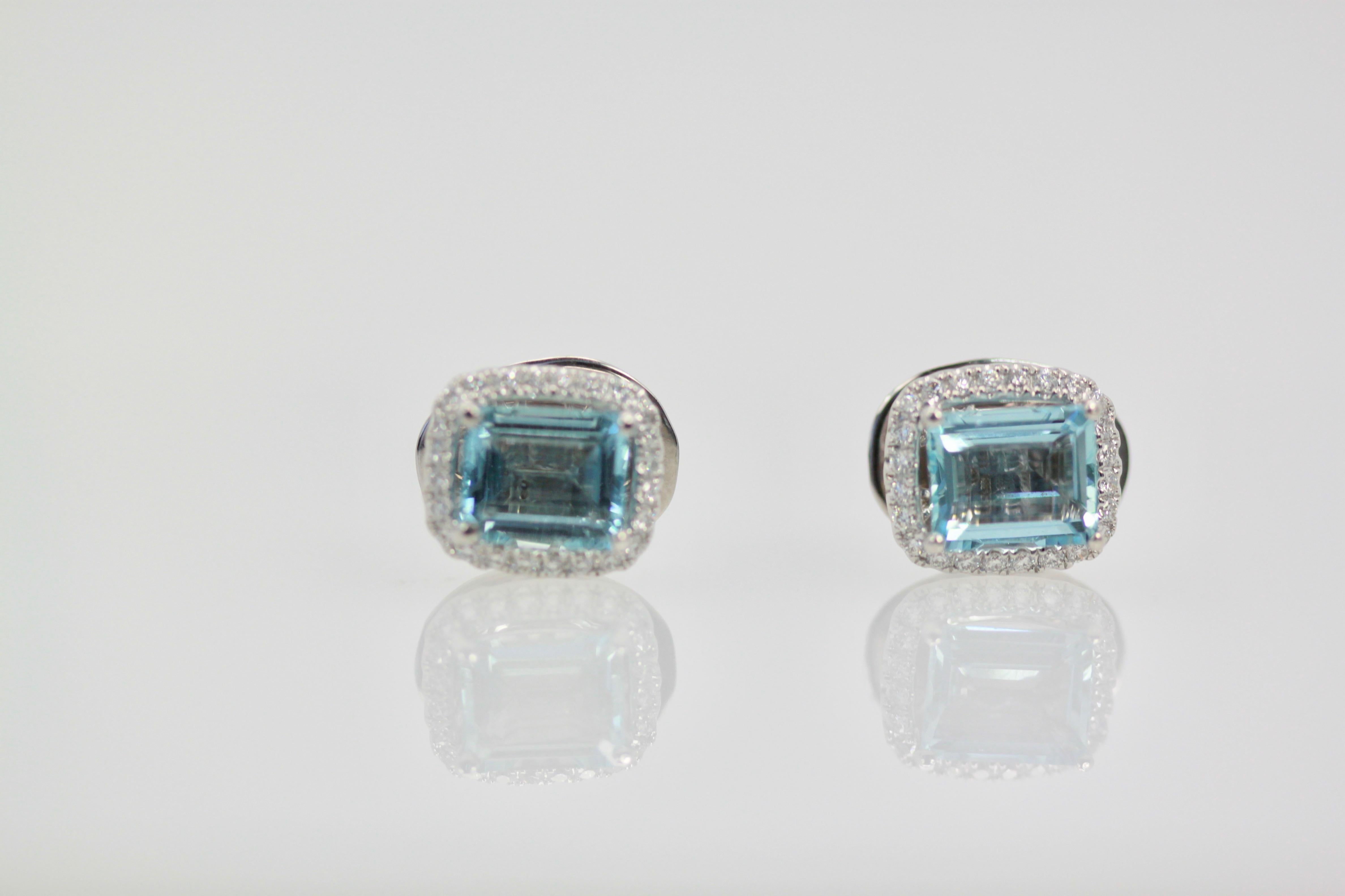 Modern Aquamarine Earrings with a Diamond Surround