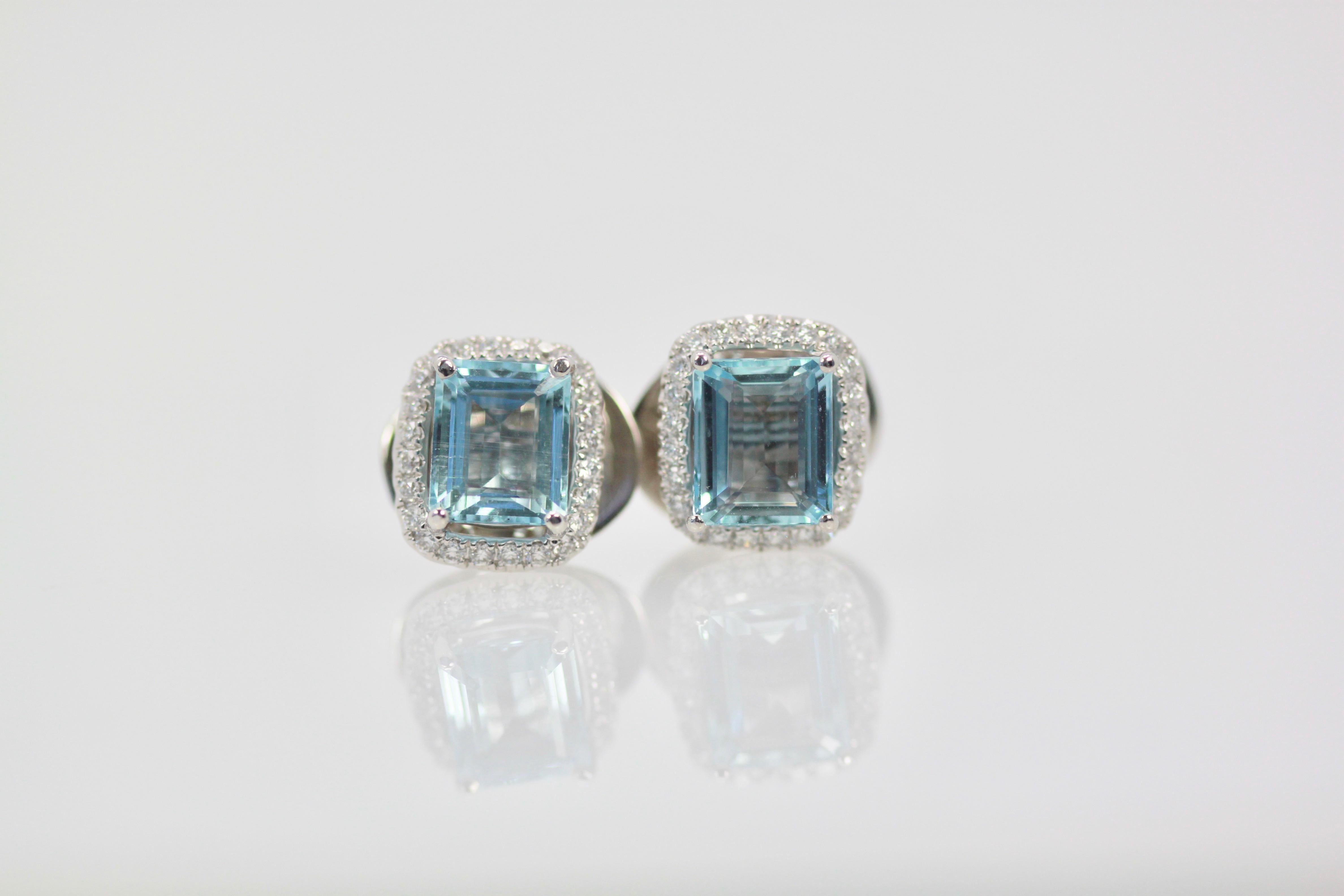 Women's Aquamarine Earrings with a Diamond Surround