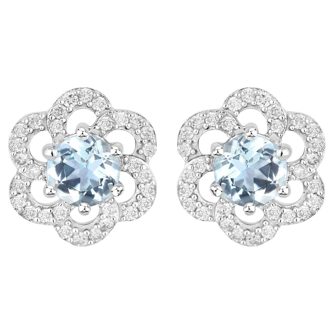 Boucles d'oreilles aigue-marine avec diamants 0.58 carats or blanc 14K