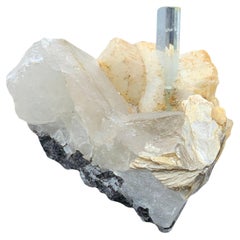 Aquamarine elongated on Muscovite Combine with Quartz