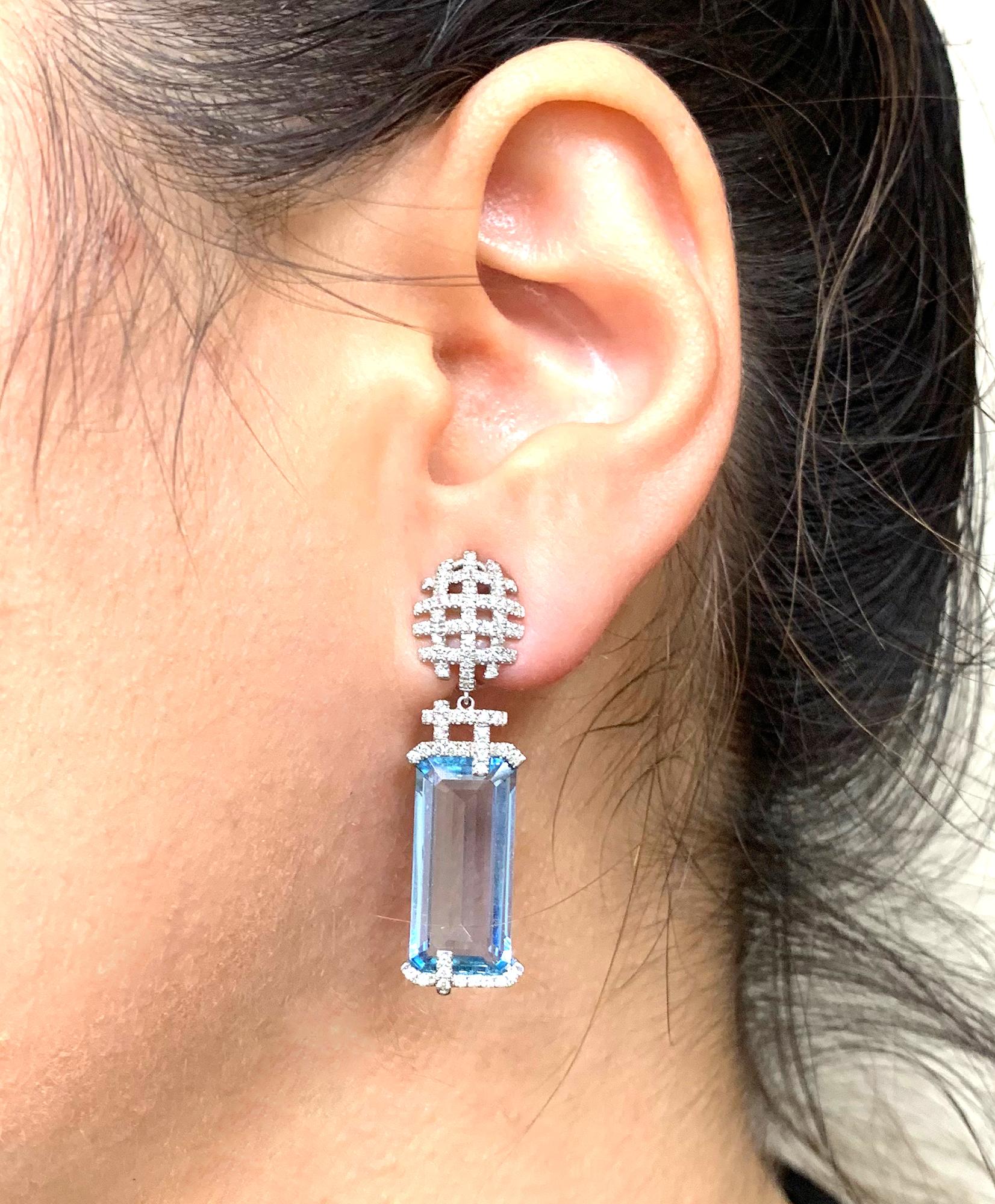 Aquamarine Emerald Cut with Diamond Set Pave Earrings in 18K White Gold, from 'G-One' Collection

Stone Size: 18.7 x 8.8 mm

Approx. Wt: 11.70 Carats (Aquamarine) 

Diamonds: G-H / VS, Approx Wt: 0.49 Carats 