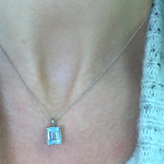 Aquamarine emerald cut pendant necklace 18k white gold