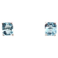 Aquamarine emerald cut solitaire stud earrings 18k white gold
