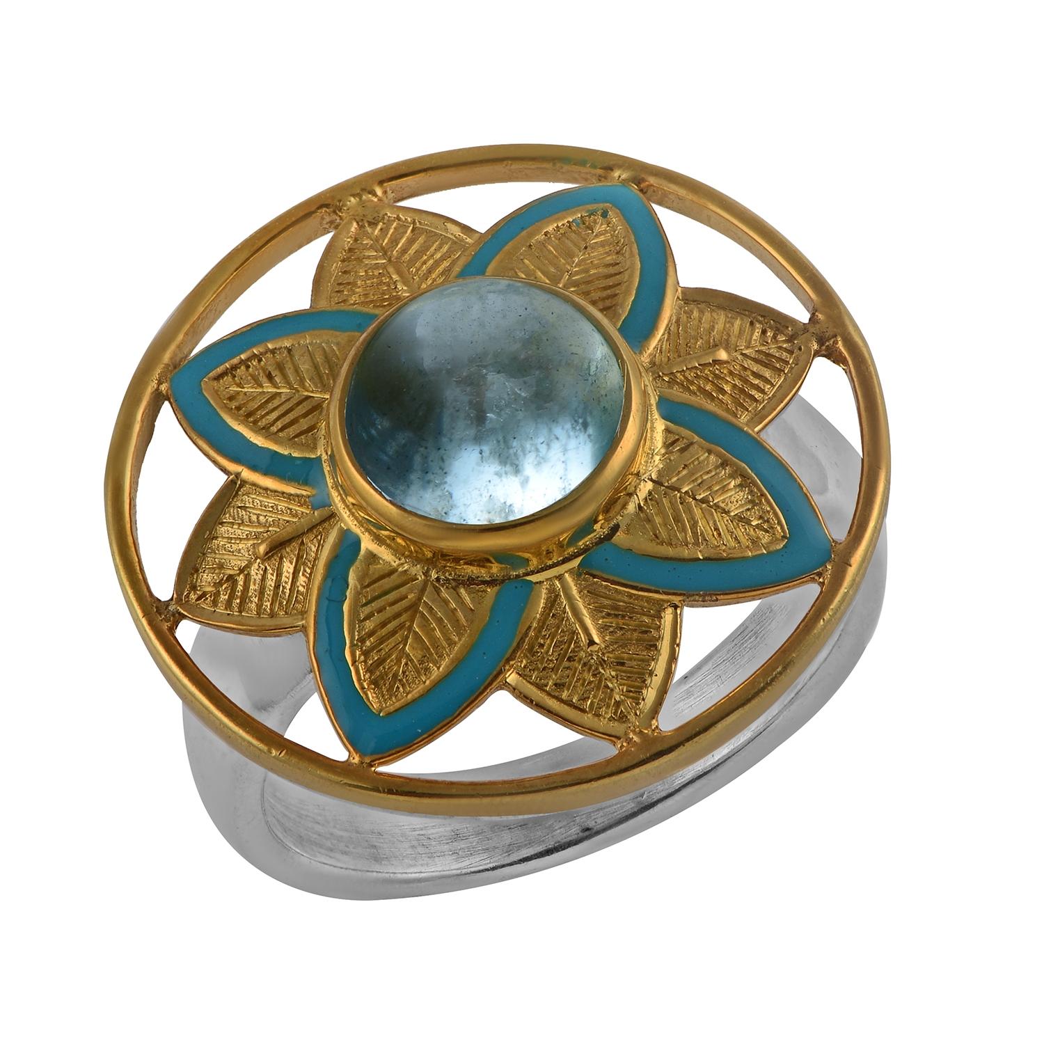 

This striking aquamarine and enamel cocktail ring has been handmade in our workshops. We have used jaali, hand-engraving and enamel work in the ring, and embedded it with an aquamarine. The shank is made in hammered sterling silver and the top of