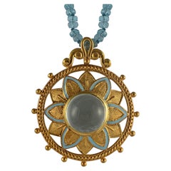 Pendentif en émail aigue-marine