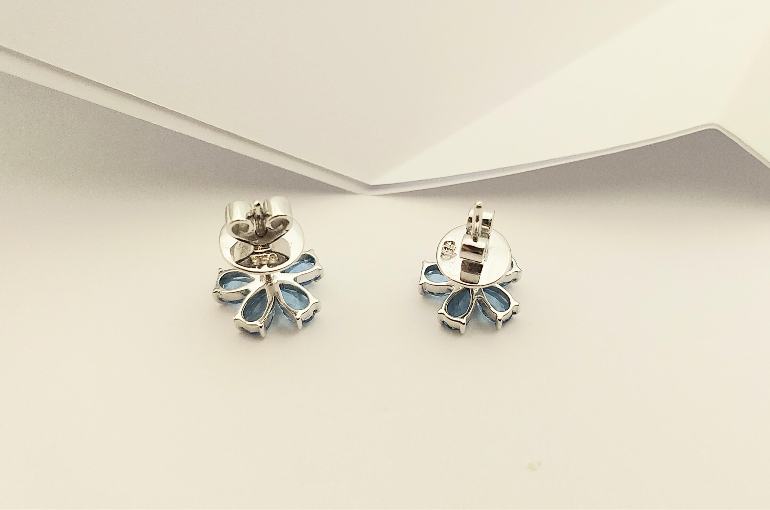 Women's Aquamarine Flower Earrings Set in 18 Karat White Gold Settings For Sale