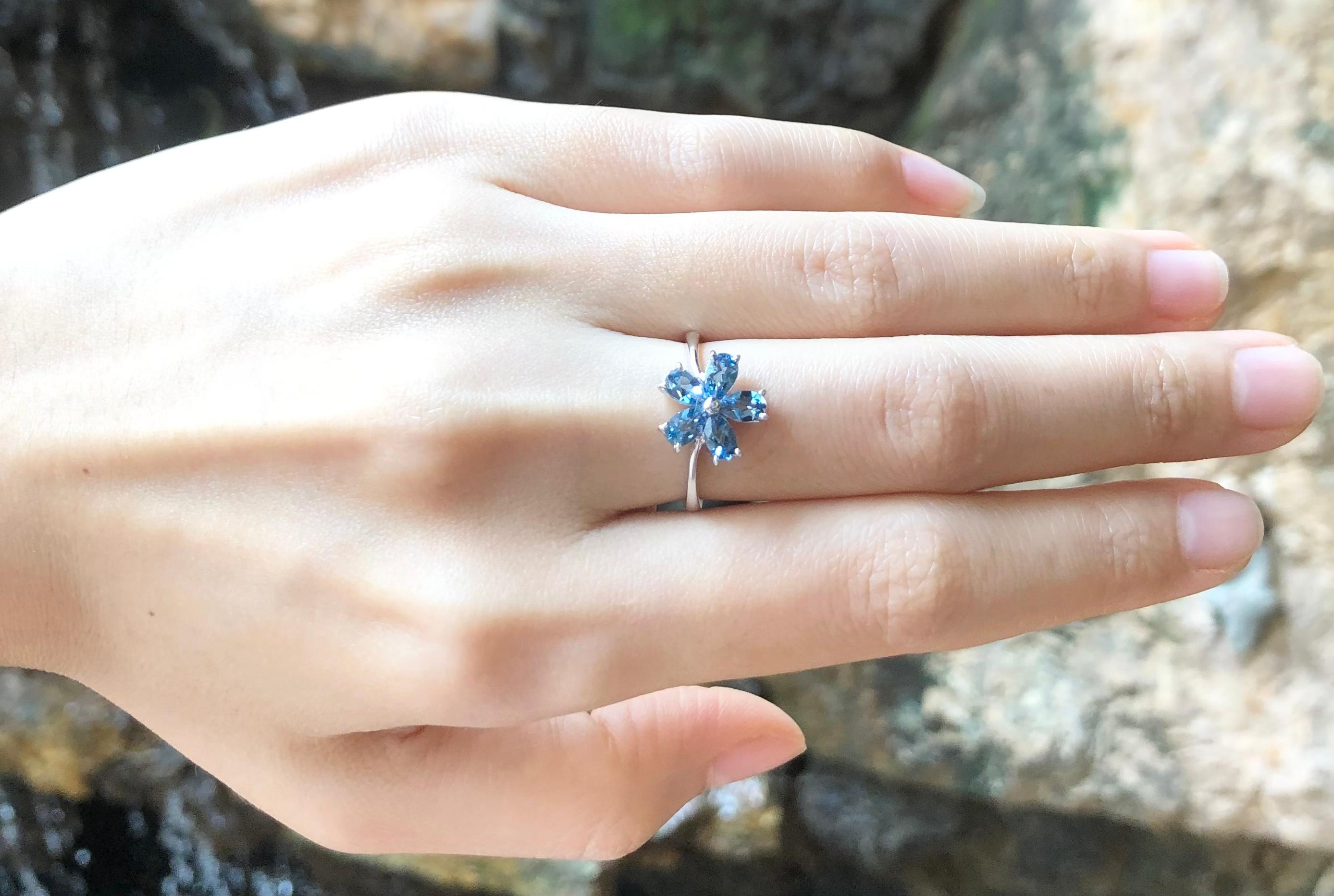 Pear Cut Aquamarine Flower Ring Set in 18 Karat White Gold Settings For Sale