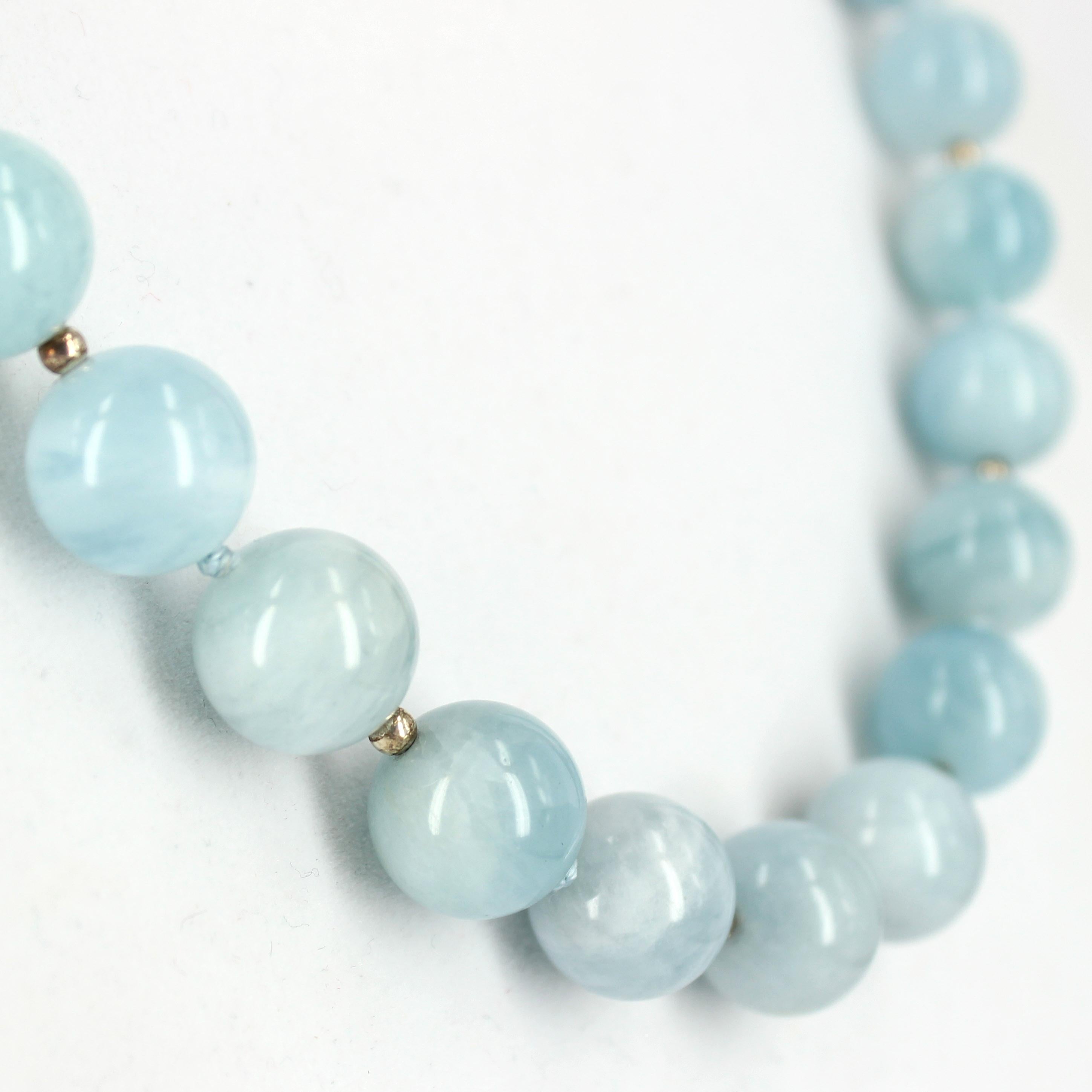 This beautiful 14mm Natural Aquamarine necklace features 32 high polished beads with added 3mm Sterling Silver beads and knotted in sections, finished with Sterling Silver bolt clasp. A simple necklace that you can dress up or dress down.

Total
