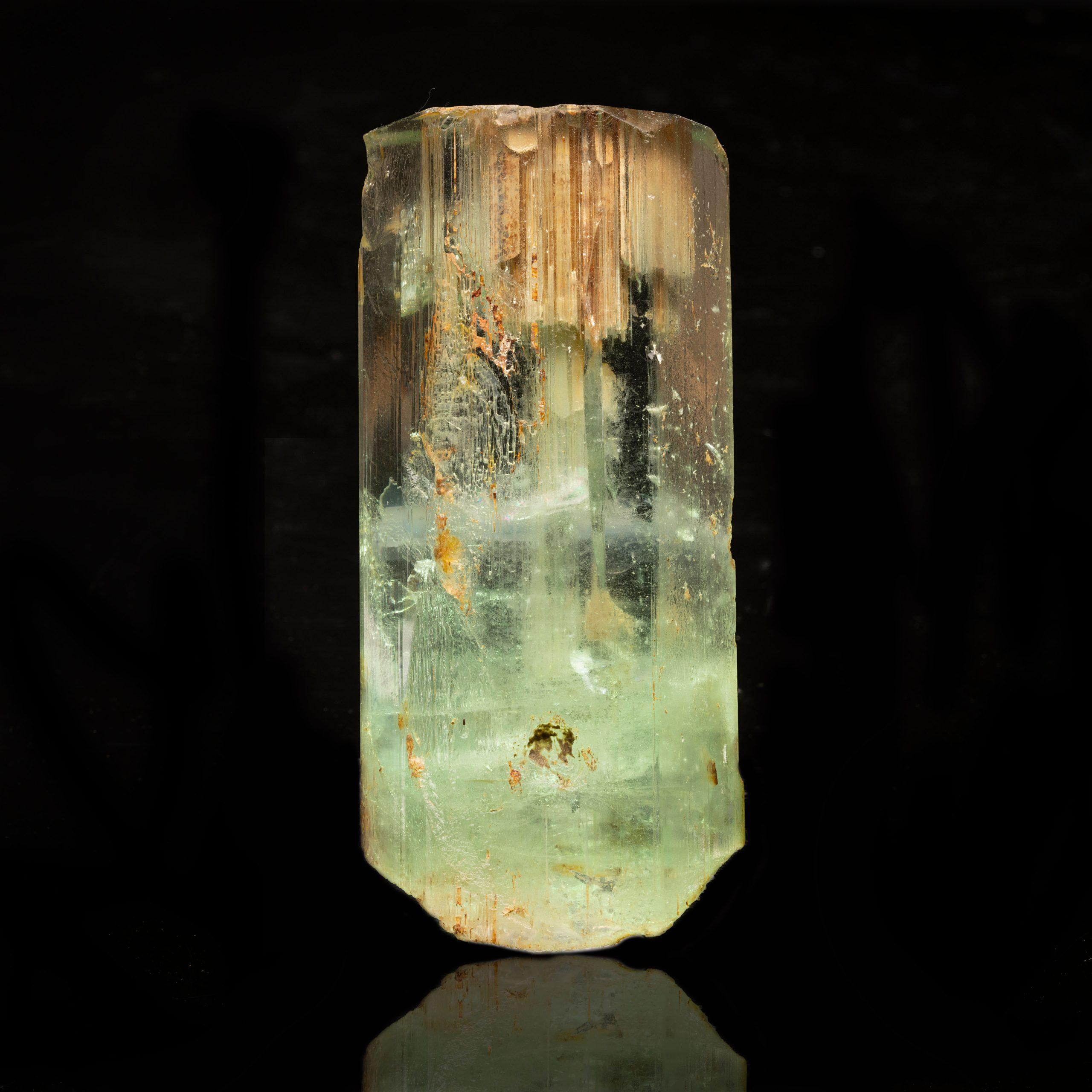 This huge bevel terminated single aquamarine crystal features incredible clarity. From the northwest region of Minas Gerais, Brazil, a location known for the production of excellent quality pegmatites like beryl, this specimen was collected
