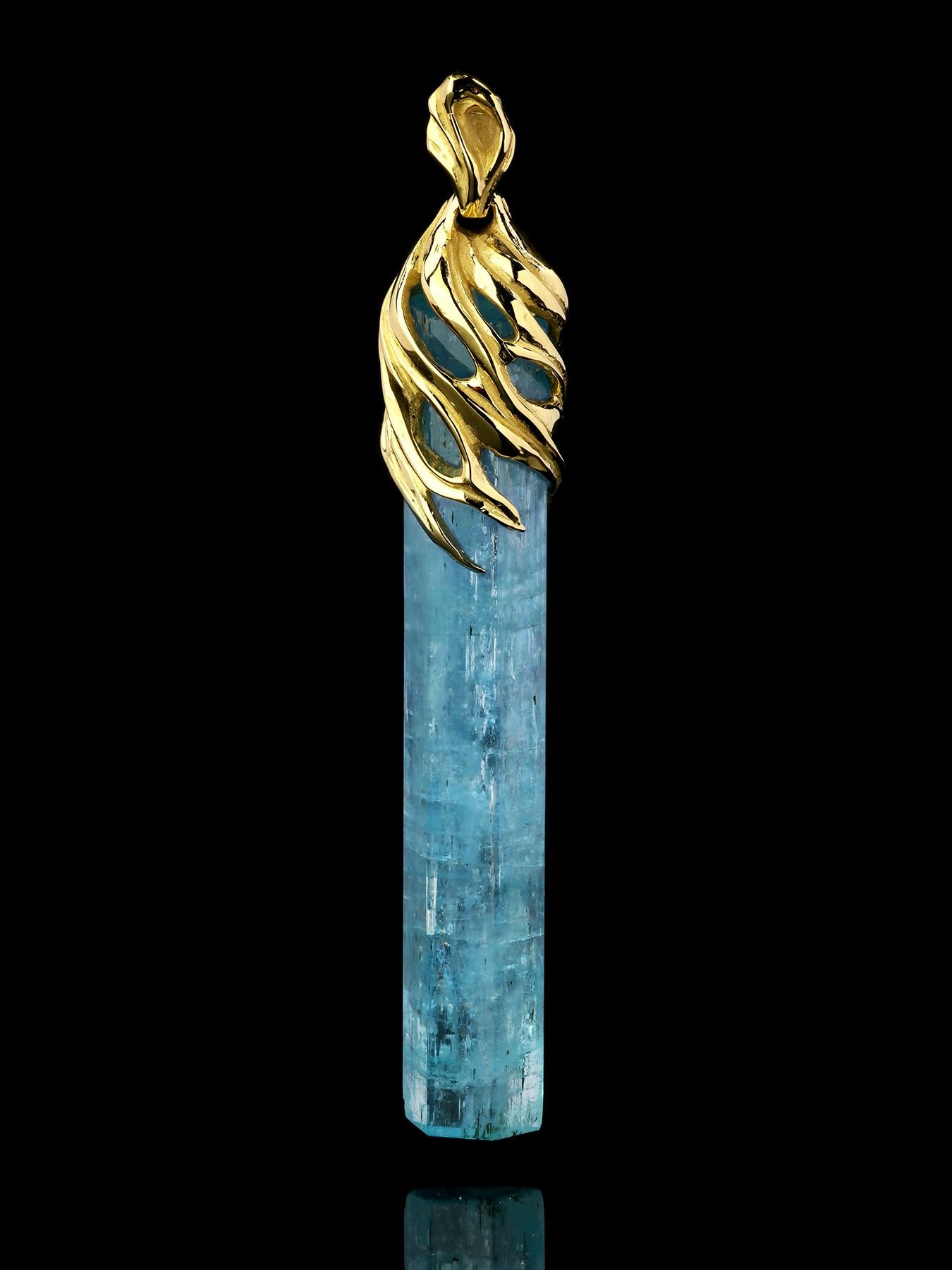 Aquamarine crystal 14K yellow gold pendant
aquamarine measurements - 0.28 x 0.35 x 1.77 in / 7 х 9  х 45 mm
aquamarine weight - 26.8 carat
pendant lenght - 60 mm
pendant weight - 9.75 grams


We ship our jewelry worldwide – for our customers it is