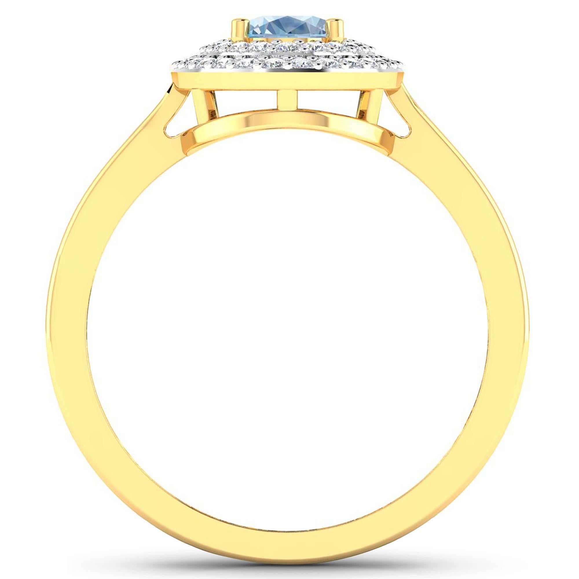 Aquamarine Gold Ring, 14Kt Gold Aquamarine & Diamond Engagement Ring, 0.76ctw.

Flaunt yourself with this 14K Yellow Gold Aquamarine & White Diamond Engagement Ring. The setting is inlaid with 46 accented full-cut White Diamond round stones for a