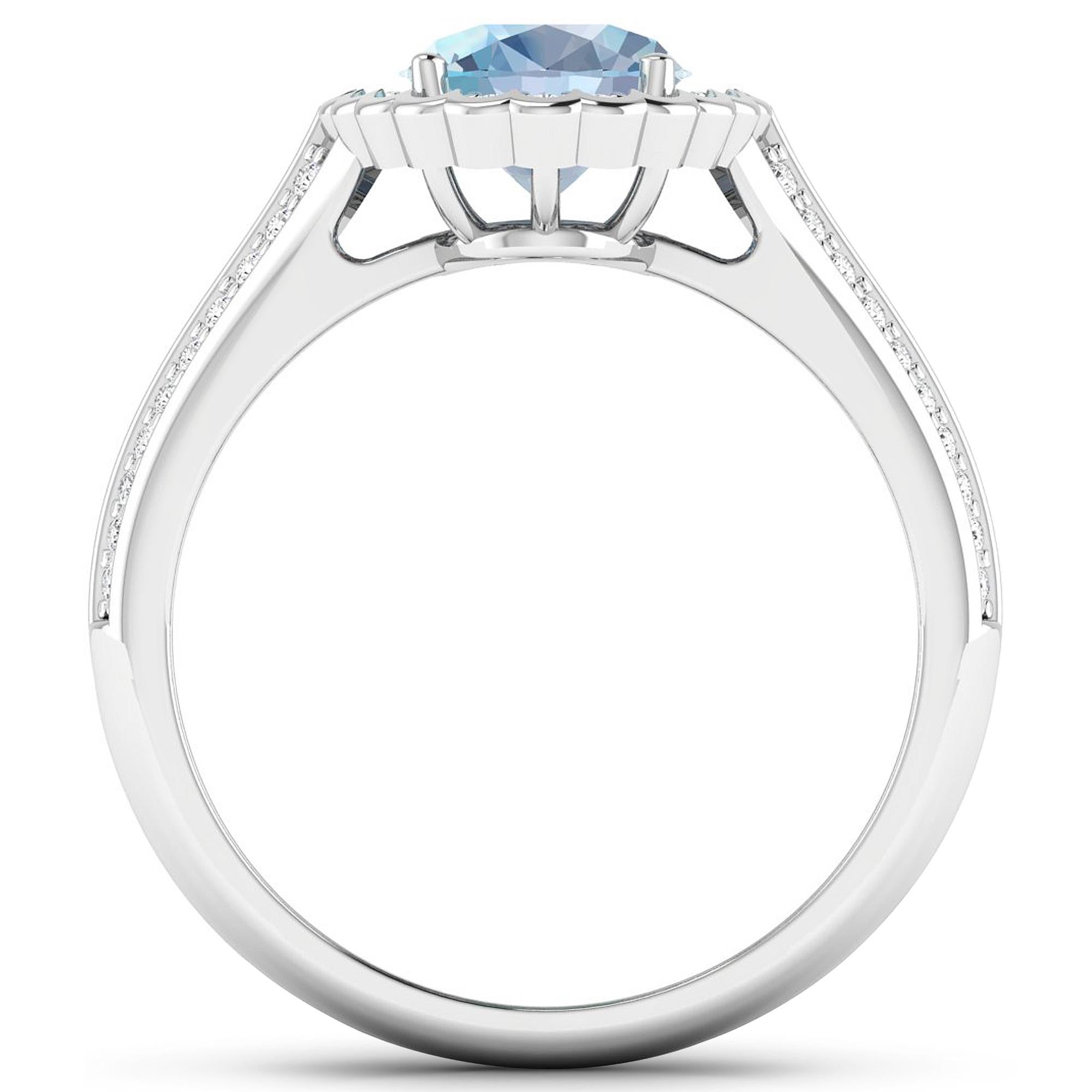 Aquamarine Gold Ring, 14Kt Gold Aquamarine & Diamond Engagement Ring, 1.82ctw.

Flaunt yourself with this 14K White Gold Aquamarine & White Diamond Engagement Ring. The setting is inlaid with 62 accented full-cut White Diamond round stones for a