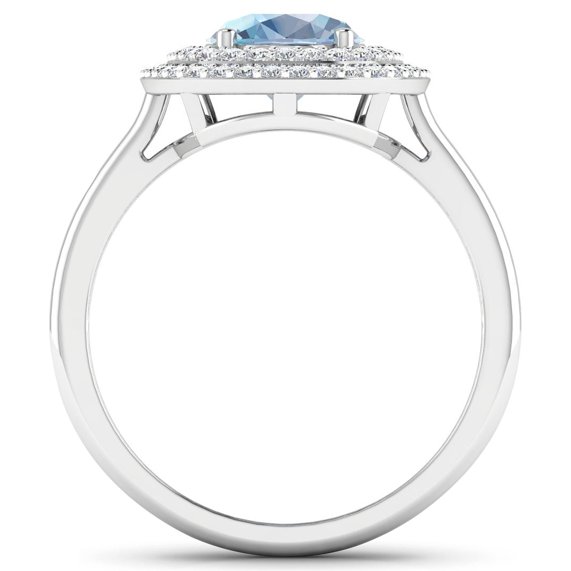Aquamarine Gold Ring, 14Kt Gold Aquamarine & Diamond Engagement Ring, 1.68ctw.

Flaunt yourself with this 14K White Gold Aquamarine & White Diamond Engagement Ring. The setting is inlaid with 62 accented full-cut White Diamond round stones for a