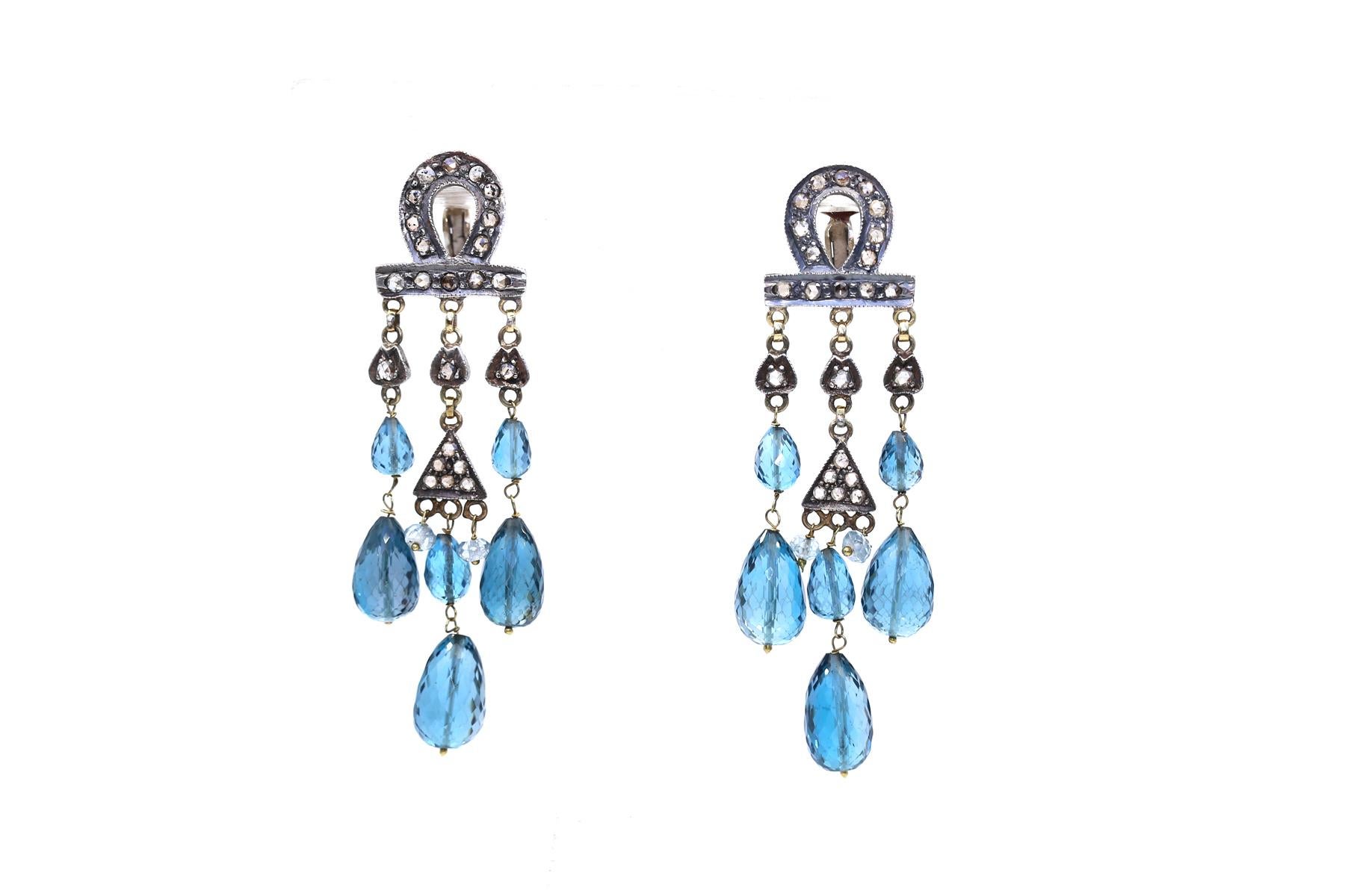 Aquamarine Gold Silver Diamonds Chandelier Earrings. Aquamarine Gold Silver Diamonds Chandelier Earrings. Chandelier Earrings with fine Aquamarine and Diamonds, cast in Silver and Gold.  The aquamarine shade and color is bright and vivid. All the