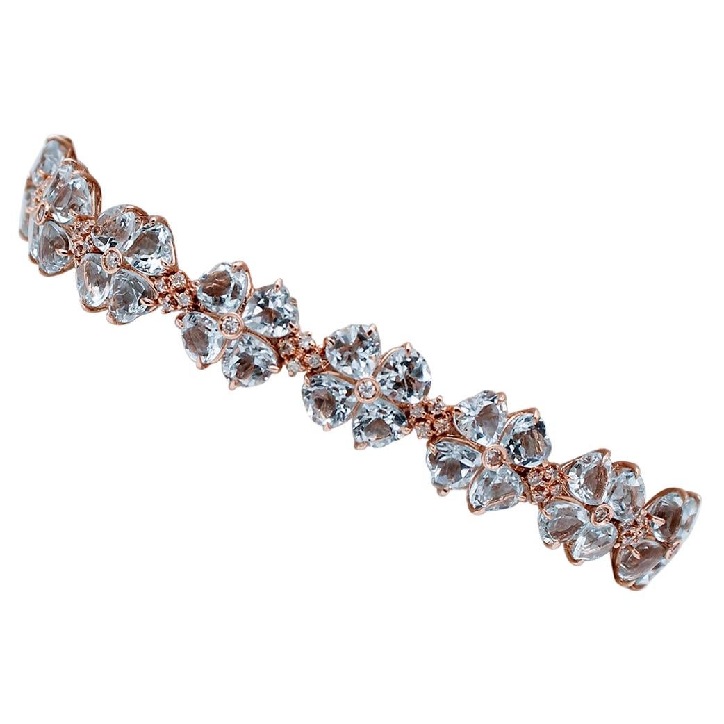 Bracelet en or rose 14 carats avec cœurs d'aigue-marine et diamants