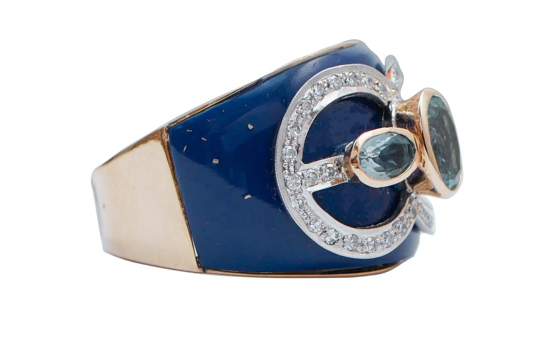 Fantastic band ring in 14 kt rose gold structure mounted with a band of lapis. On it, a structure in white gold studded with diamonds and three aquamarine.
This ring was totally handmade by Italian master goldsmiths and it is in perfect