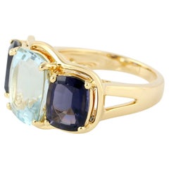 Anello a 3 pietre con acquamarina e lolite in oro giallo 18k