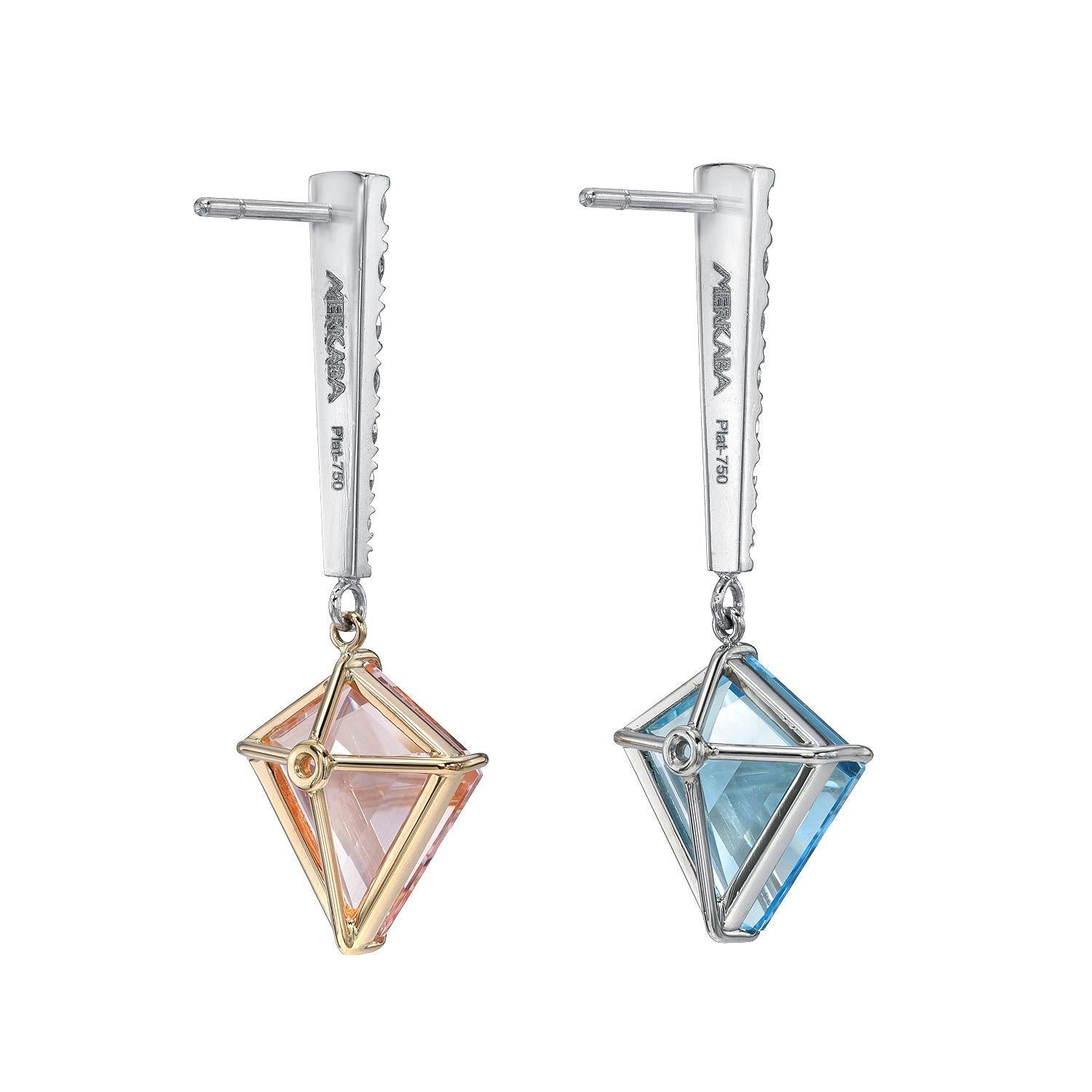 Exclusive 6.88 carat total Aquamarine and Morganite kite shape earrings, suspending from a tapered diamond bar totaling 0.77 carats.
Crafted by extremely skilled hands in the USA. Platinum and 18K rose gold.
Returns are accepted and paid by us