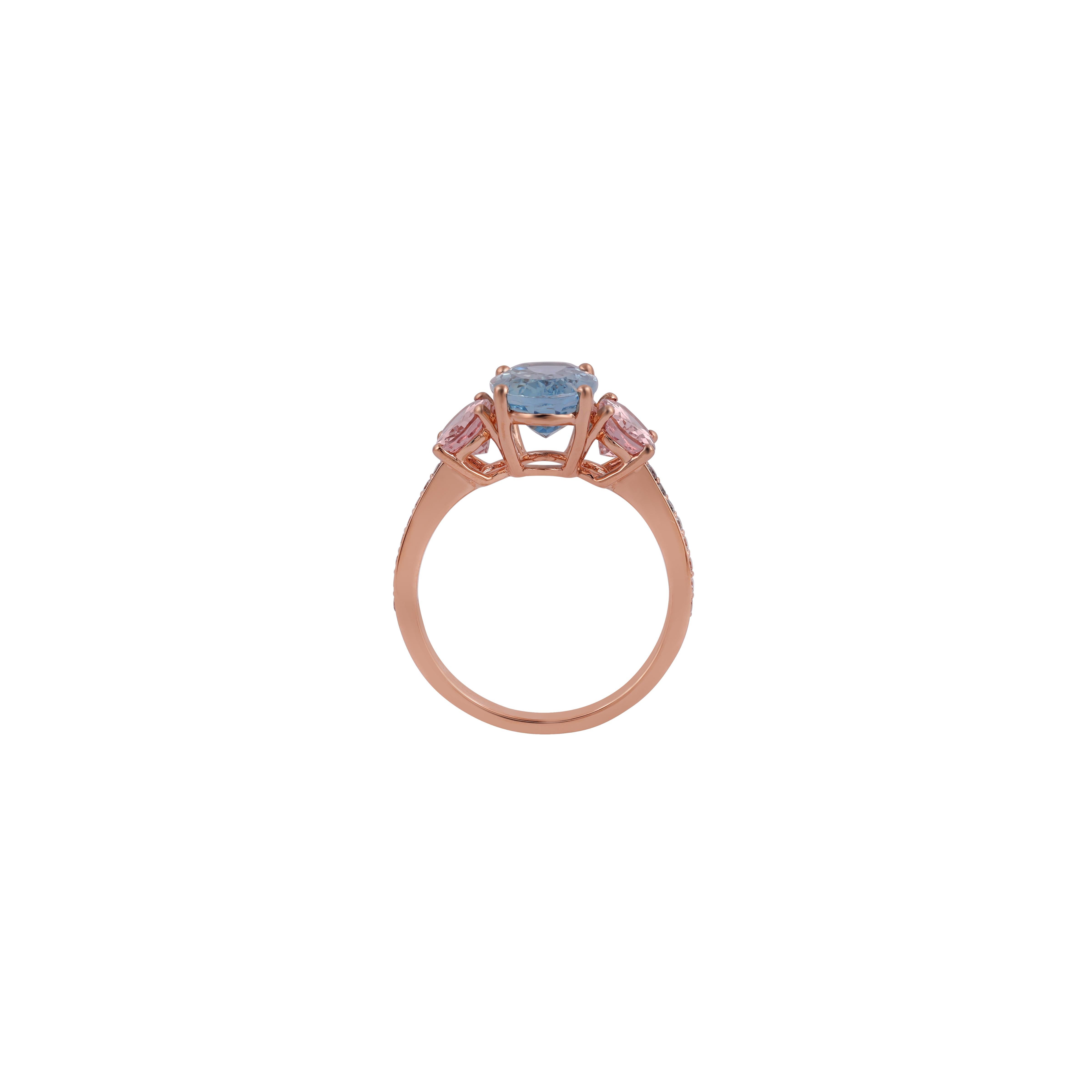 Elegant Oval Cut Aquamarine And Morganite Ring with  Sparkly Round cut Diamonds in 18kt Rose Gold mounting.

Aquamarine (2.46 Carat) - Embodies the splendor of the sea, Unparalleled clarity and a soft, delicate tone which radiates life, vibrancy and