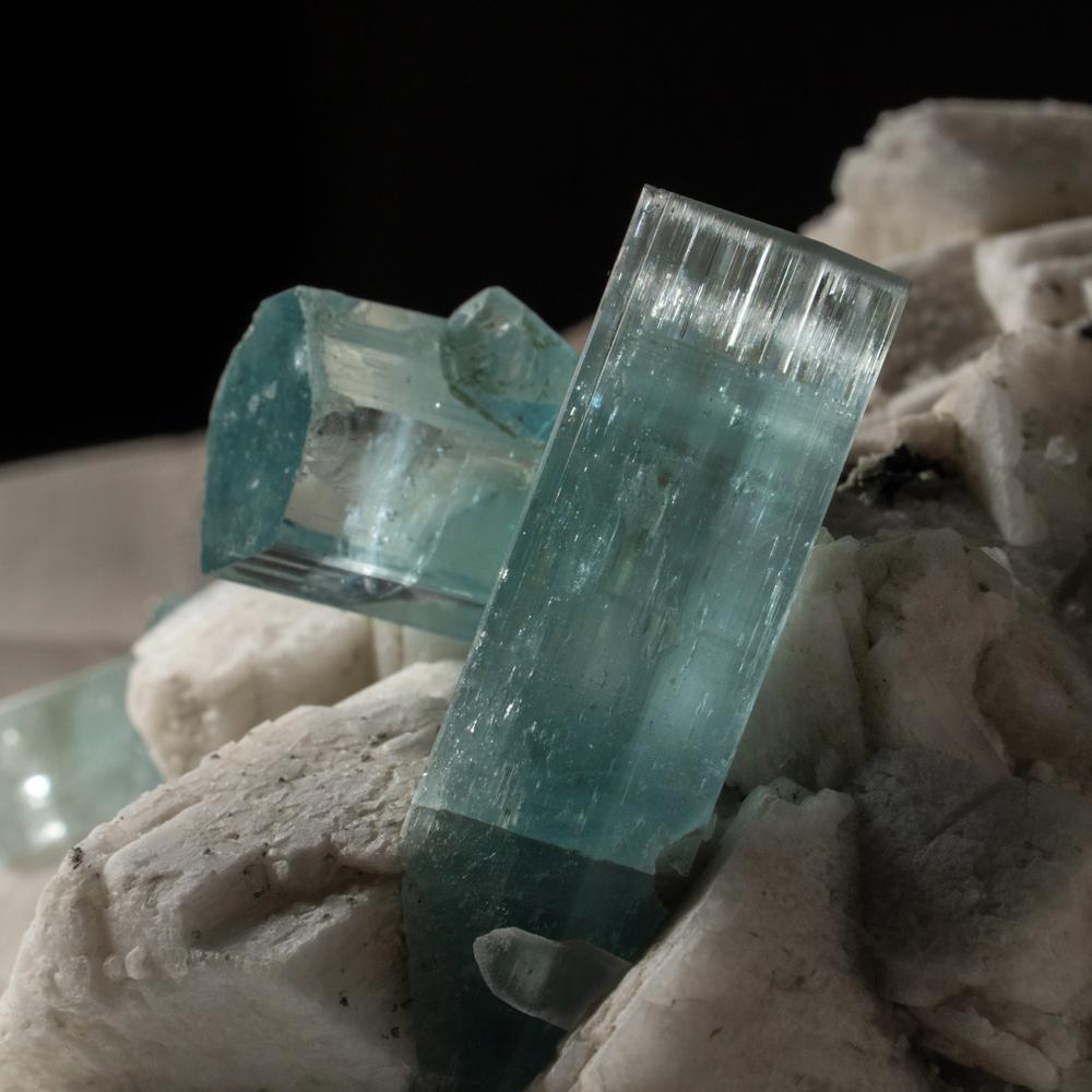 From Skardu Road, Baltistan, Northern Areas, Pakistan

Large interesting quartz crystals with a cluster of microline at the center with gem transparent aquamarine crystals.The aqua crystals are full terminated with rich transparency and lustrous