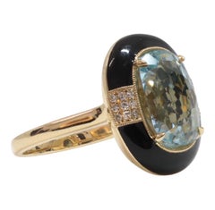 Anello cocktail con acquamarina, onice e diamanti in oro giallo 14 carati